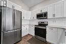 212 Cowan Crescent, Martensville, SK  - Indoor Photo Showing Kitchen 