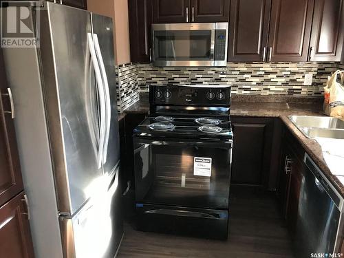 45 120 Acadia Drive, Saskatoon, SK - Indoor Photo Showing Kitchen With Double Sink With Upgraded Kitchen