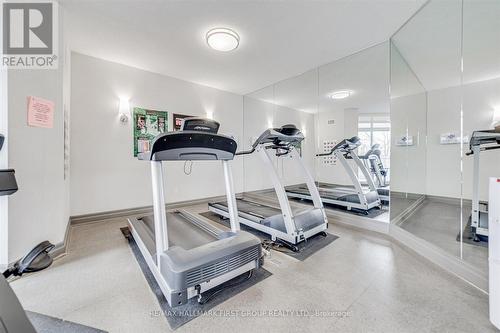 604 - 360 Watson Street W, Whitby (Port Whitby), ON - Indoor Photo Showing Gym Room