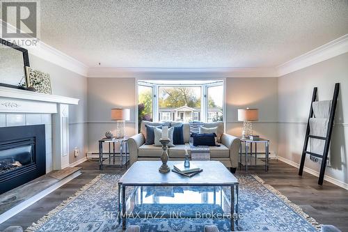 5 Kawartha Road, Clarington (Newcastle), ON - Indoor Photo Showing Living Room With Fireplace