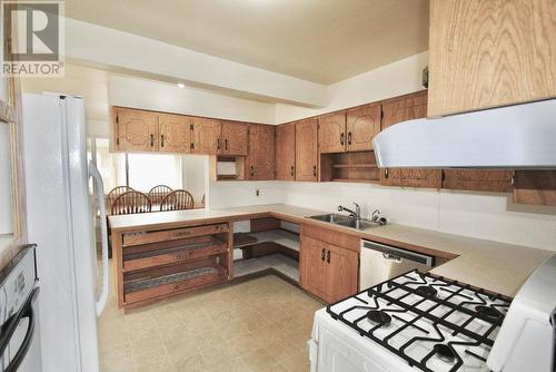 1880 Harrison Avenue, Masset, BC - Indoor Photo Showing Kitchen With Double Sink