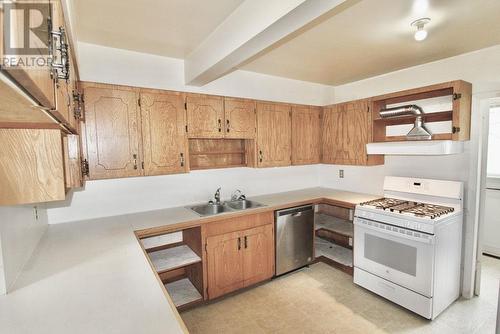 1880 Harrison Avenue, Masset, BC - Indoor Photo Showing Kitchen With Double Sink