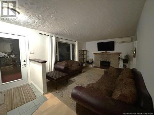 81 Kierstead Street, Lower Coverdale, NB - Indoor Photo Showing Living Room With Fireplace