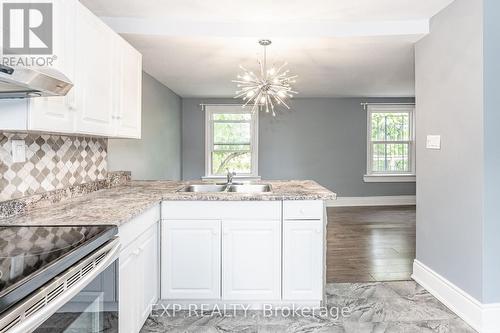 140 Gage Avenue N, Hamilton, ON - Indoor Photo Showing Kitchen With Double Sink