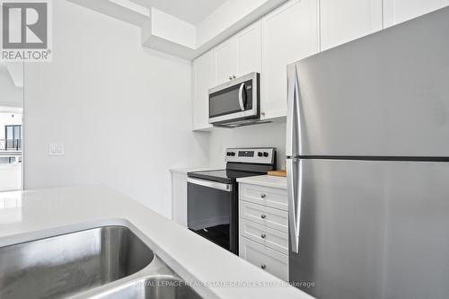 1502 - 160 Densmore Road, Cobourg, ON - Indoor Photo Showing Kitchen With Stainless Steel Kitchen With Double Sink