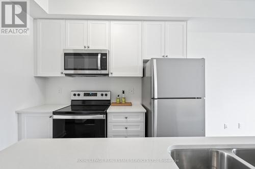 1502 - 160 Densmore Road, Cobourg, ON - Indoor Photo Showing Kitchen With Stainless Steel Kitchen With Double Sink