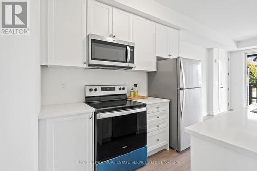 1502 - 160 Densmore Road, Cobourg, ON - Indoor Photo Showing Kitchen With Stainless Steel Kitchen