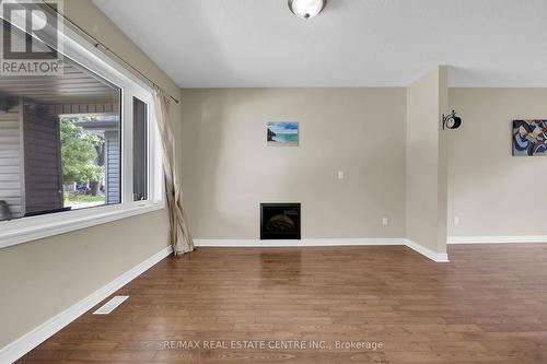 31 Gibson Avenue, Hamilton, ON - Indoor Photo Showing Other Room With Fireplace