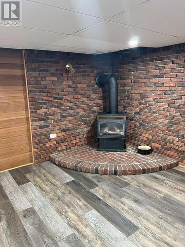 5903 Delaware Street, Niagara Falls, ON - Indoor Photo Showing Other Room With Fireplace