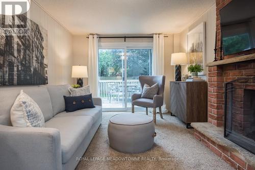 586 Hayward Crescent, Milton, ON - Indoor Photo Showing Living Room With Fireplace