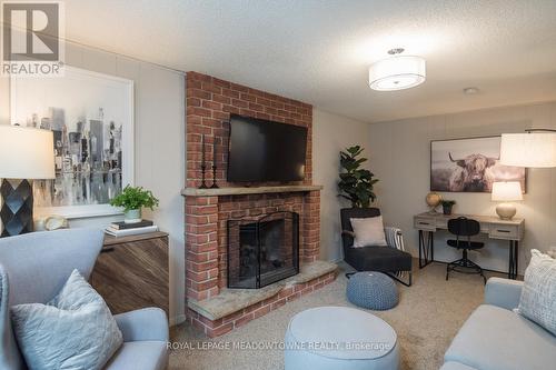 586 Hayward Crescent, Milton, ON - Indoor Photo Showing Living Room With Fireplace