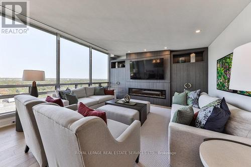 Ph2 - 2170 Marine Drive, Oakville, ON - Indoor Photo Showing Living Room With Fireplace