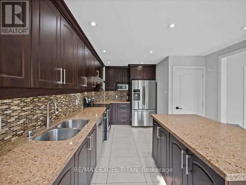 27 Macdougall Drive, Brampton, ON - Indoor Photo Showing Kitchen With Stainless Steel Kitchen With Double Sink With Upgraded Kitchen