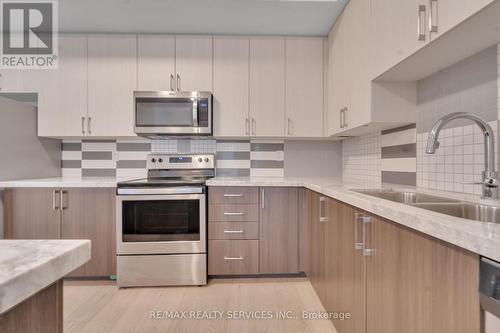 1202 - 5299 Highway 7 N, Vaughan, ON - Indoor Photo Showing Kitchen With Stainless Steel Kitchen With Double Sink With Upgraded Kitchen