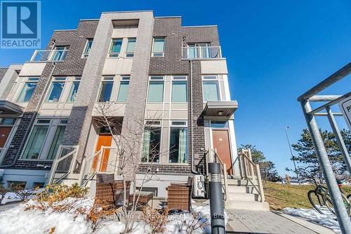 112 - 11 Applewood Lane, Toronto, ON - Outdoor With Facade