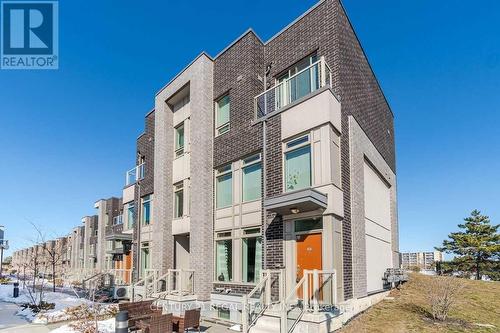 112 - 11 Applewood Lane, Toronto, ON - Outdoor With Facade