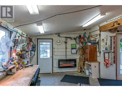 2150 Rashdale Road, Spallumcheen, BC - Indoor Photo Showing Other Room With Fireplace