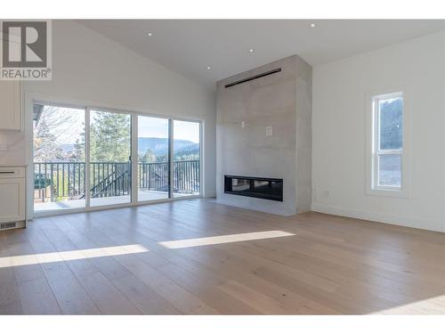 3271 Evergreen Drive, Penticton, BC - Indoor Photo Showing Living Room With Fireplace