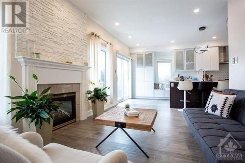 5 Halkirk Avenue, Kanata, ON - Indoor Photo Showing Living Room With Fireplace