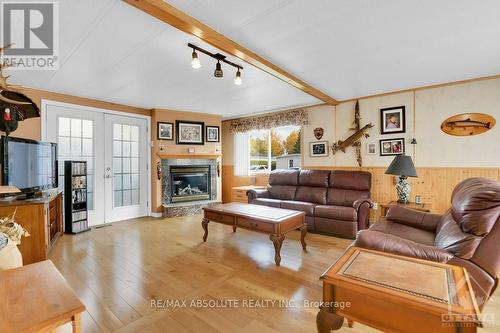 86 - 3535 St Joseph Boulevard, Ottawa, ON - Indoor Photo Showing Living Room With Fireplace