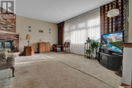 5832 Mayer Place, Regina, SK - Indoor With Fireplace