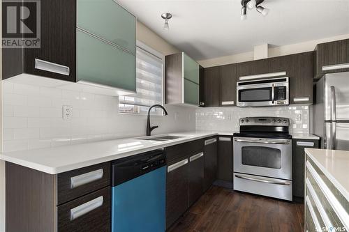 109 1510 Neville Drive, Regina, SK - Indoor Photo Showing Kitchen With Stainless Steel Kitchen With Double Sink