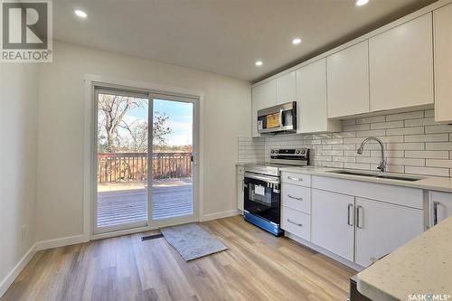 78 Deergrove Crescent, Regina, SK - Indoor Photo Showing Kitchen With Double Sink