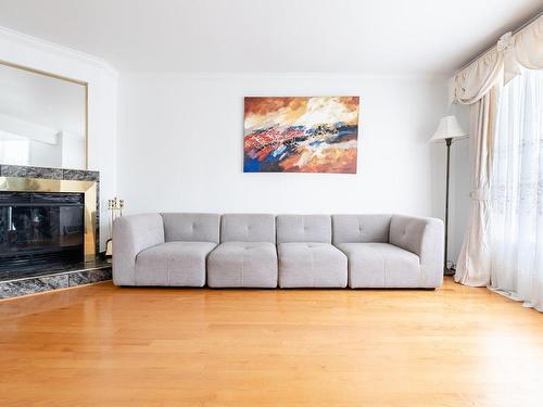 Salon - 3695 Rue Des Pétunias, Longueuil (Saint-Hubert), QC - Indoor Photo Showing Living Room With Fireplace