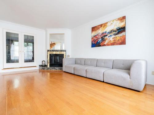 Salon - 3695 Rue Des Pétunias, Longueuil (Saint-Hubert), QC - Indoor Photo Showing Living Room With Fireplace