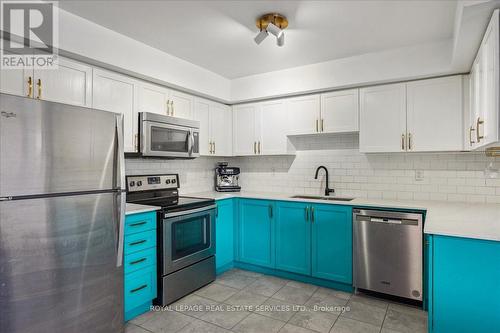 38 - 2480 Post Road, Oakville, ON - Indoor Photo Showing Kitchen With Double Sink