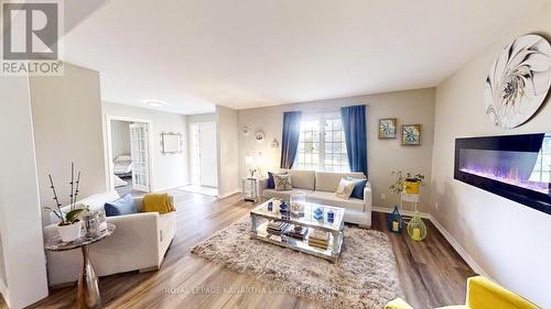 26 Maple Gate, Ramara, ON - Indoor Photo Showing Living Room With Fireplace