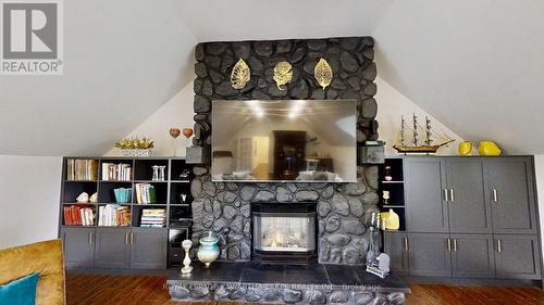 26 Maple Gate, Ramara, ON - Indoor Photo Showing Other Room With Fireplace