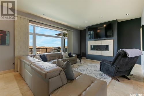 22 Hood Road, Longlaketon Rm No. 219, SK - Indoor Photo Showing Living Room With Fireplace