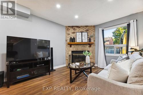 54 Magill Drive, Ajax, ON - Indoor Photo Showing Living Room With Fireplace