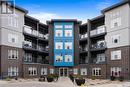 410 5303 Universal Crescent, Regina, SK  - Outdoor With Balcony With Facade 