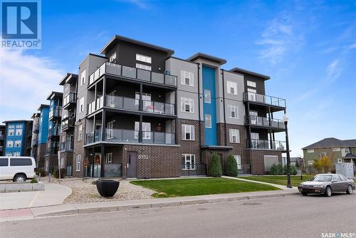 410 5303 Universal Crescent, Regina, SK - Outdoor With Balcony With Facade