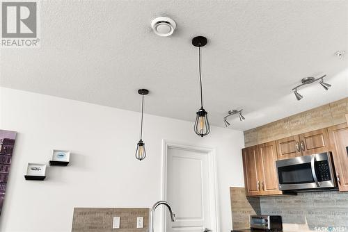 410 5303 Universal Crescent, Regina, SK - Indoor Photo Showing Kitchen