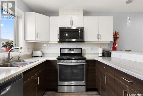 5540 Prefontaine Avenue, Regina, SK - Indoor Photo Showing Kitchen With Double Sink