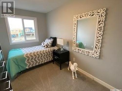 126 Antonini Court, Saskatoon, SK - Indoor Photo Showing Bedroom