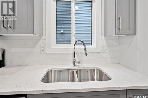 126 Antonini Court, Saskatoon, SK - Indoor Photo Showing Kitchen With Double Sink