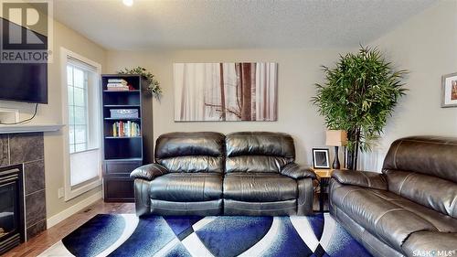 3341 Green Moss Lane, Regina, SK - Indoor Photo Showing Living Room With Fireplace