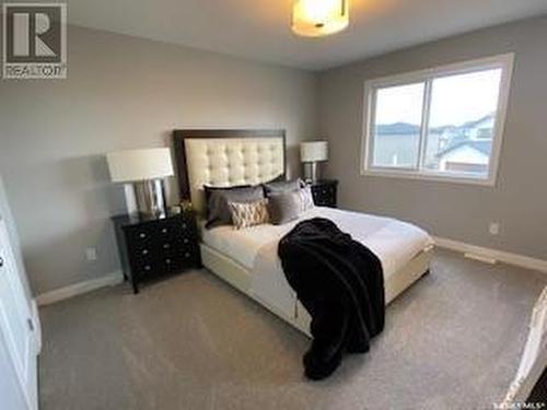 122 Antonini Court, Saskatoon, SK - Indoor Photo Showing Bedroom