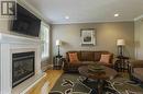 35 Desrosiers Street, Dieppe, NB  - Indoor Photo Showing Living Room With Fireplace 