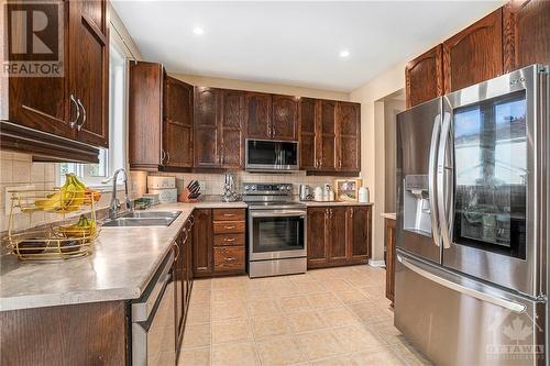 100 Monterossa Street, Ottawa, ON - Indoor Photo Showing Kitchen With Double Sink