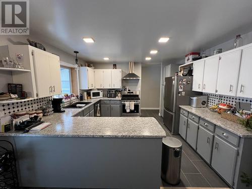 7608 Old Alaska Highway, Fort Nelson, BC - Indoor Photo Showing Kitchen With Upgraded Kitchen