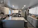 7608 Old Alaska Highway, Fort Nelson, BC  - Indoor Photo Showing Kitchen With Upgraded Kitchen 