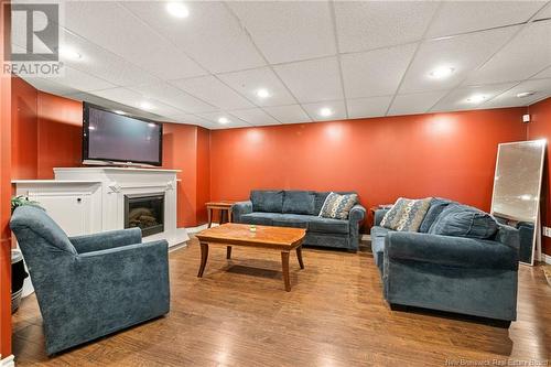 33 Trellis Court, Moncton, NB - Indoor Photo Showing Basement With Fireplace