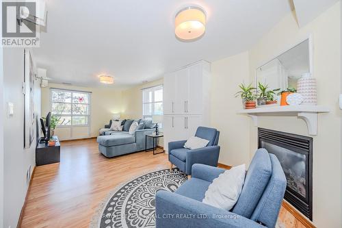 106/108 Kathleen Street, Guelph, ON - Indoor Photo Showing Living Room With Fireplace