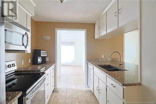 25 Westwood Drive, Fredericton, NB - Indoor Photo Showing Kitchen With Double Sink