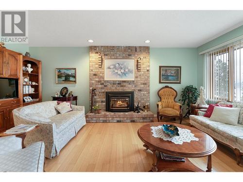 6514 Ferguson Place, Peachland, BC - Indoor Photo Showing Living Room With Fireplace